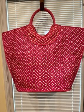 Hand woven straw beach tote